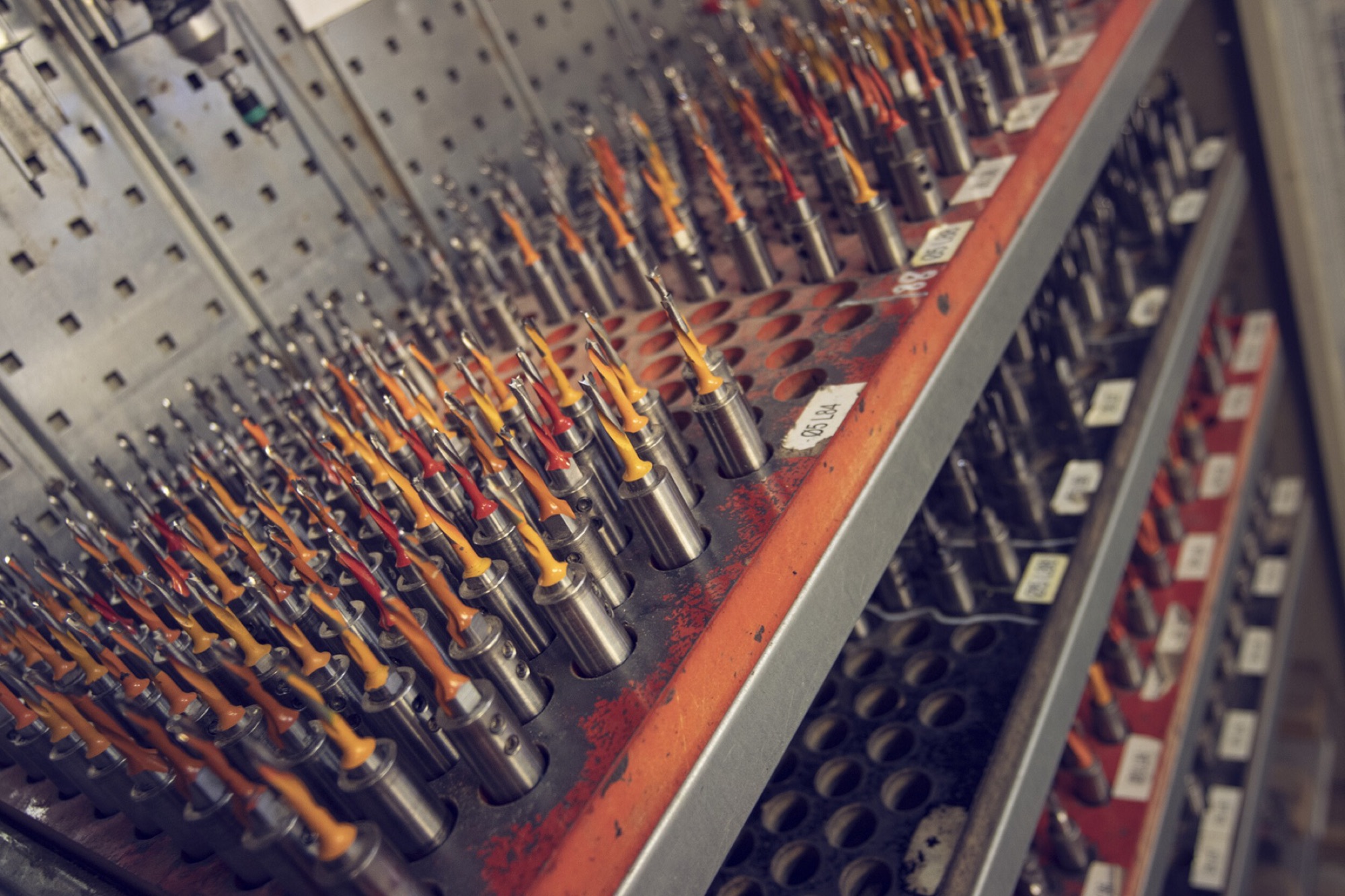 Racks of precision drill bits and tooling